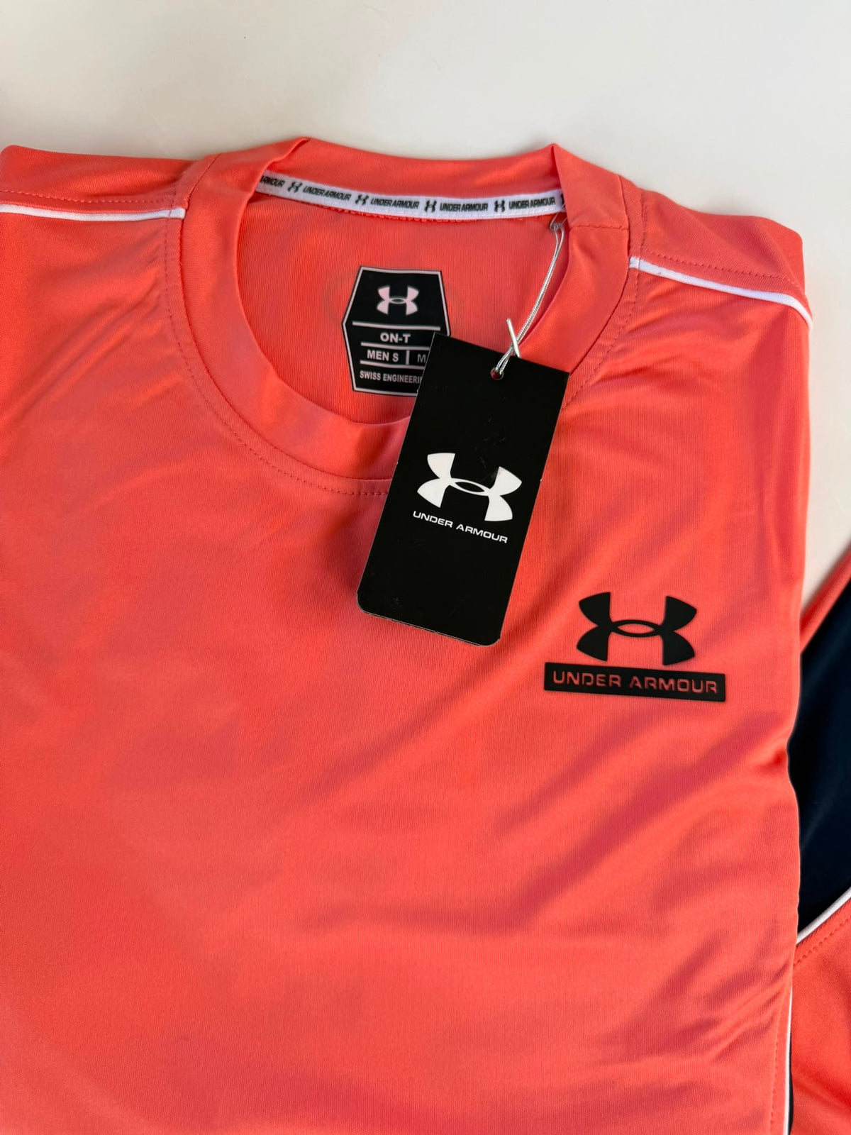Conjunto Under Armour 2026 - Coral